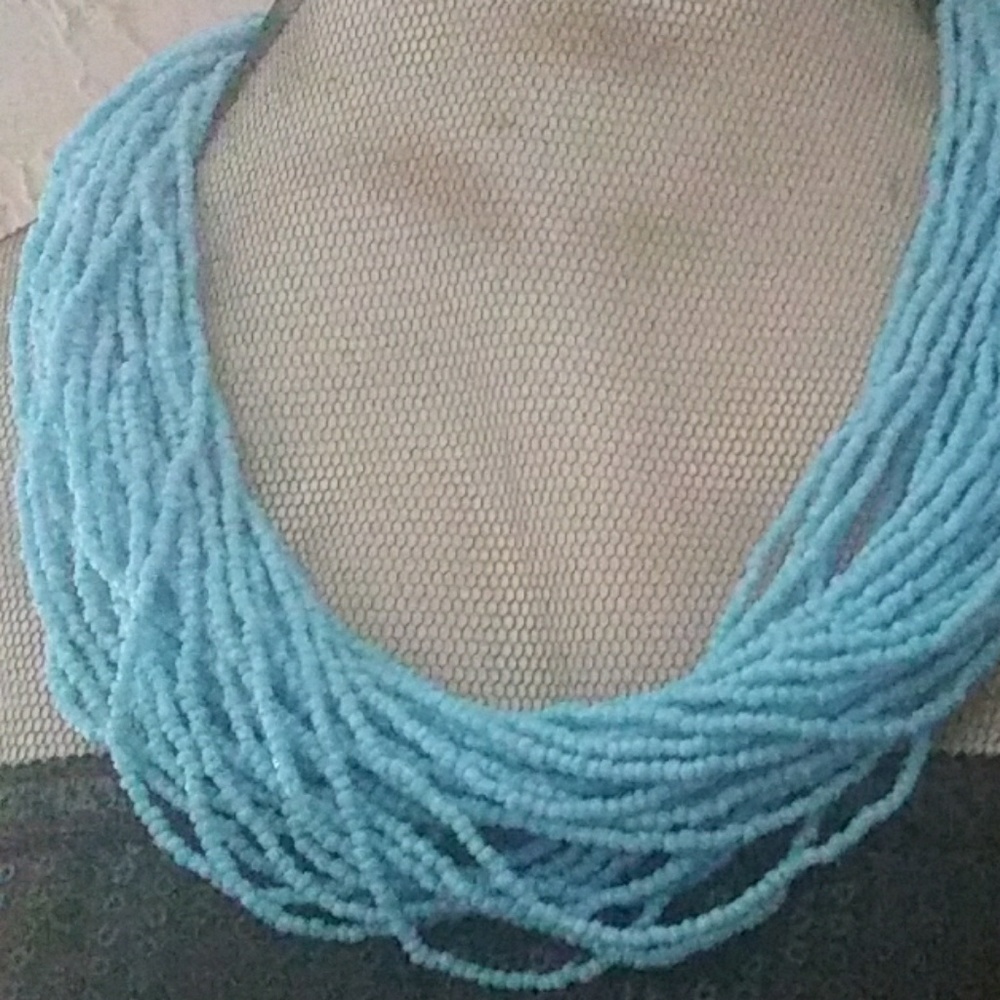 Multi strand twisted statement turquoise necklace